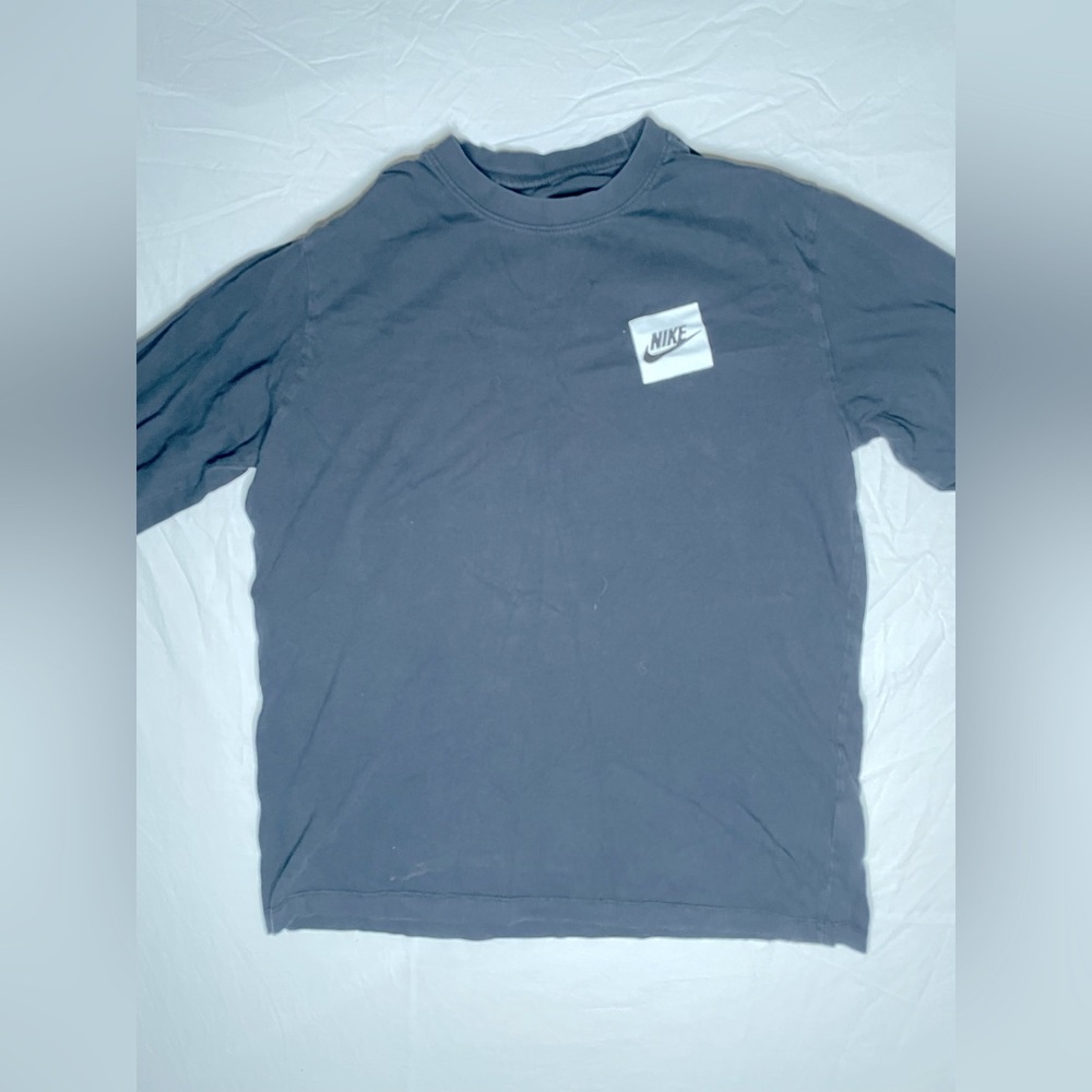 Long sleeve Black Nike Tee.
